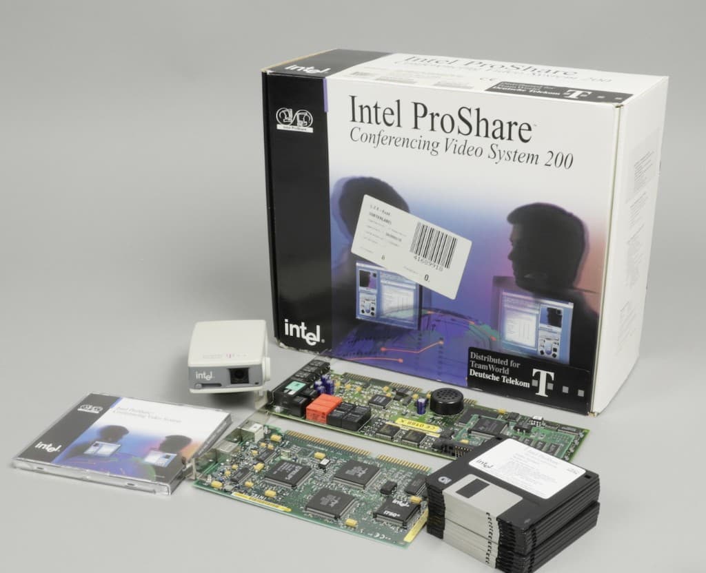 Intel ProShare Conferencing Video System 200 with camera, expansion cards, software, and packaging